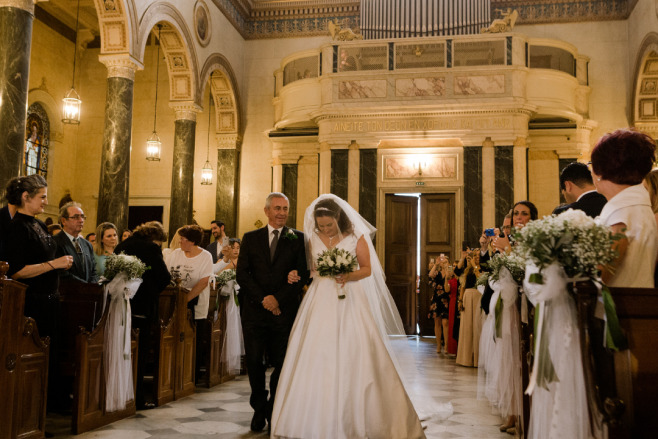 Bride and her father enter for a destination wedding ceremony