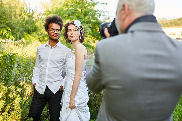 Photographer snapping some shots of a stunning couple