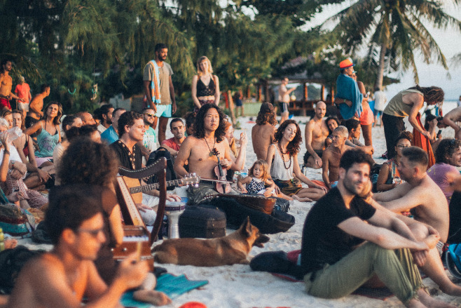 Tons of young kids on a beach during spring break