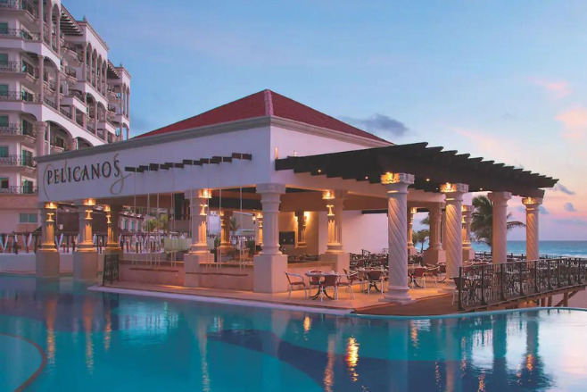 The sunsetting in Mexico at Hyatt Zilara Cancun offering cheap Cancun wedding packages