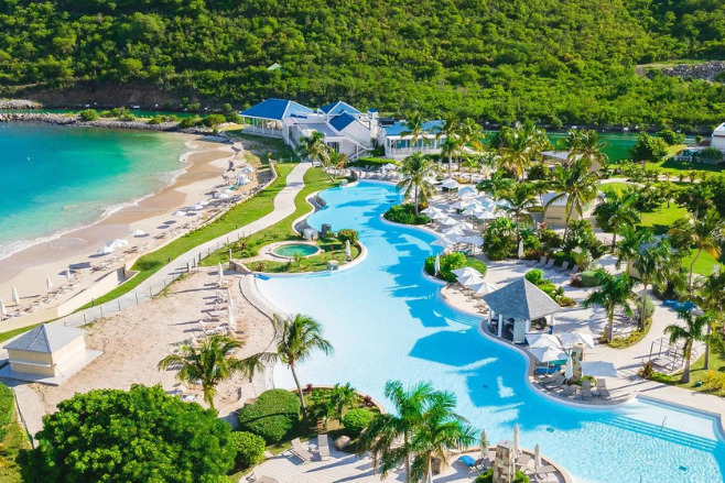 Aerial shot of tropical Secrets St. Martin offering cheap Caribbean Island wedding packages