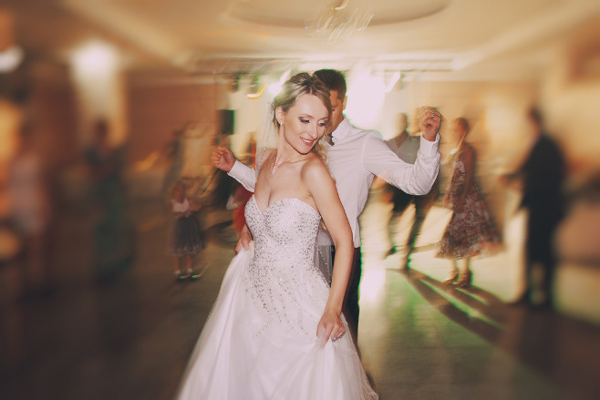 A couple dancing after their destination wedding