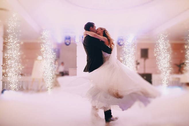 Couple dancing on the dance floor after their destination wedding