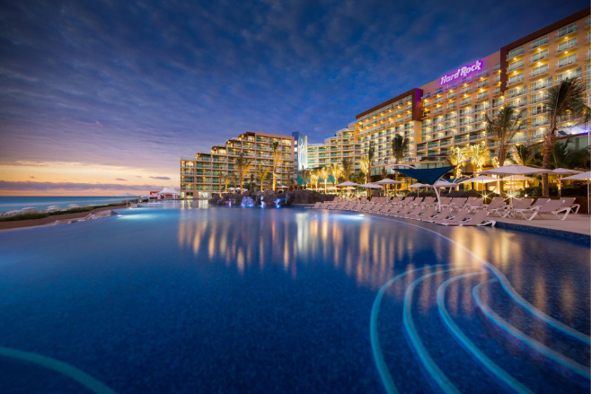 Nighttime at Hard Rock Cancun, a pet friendly wedding resort