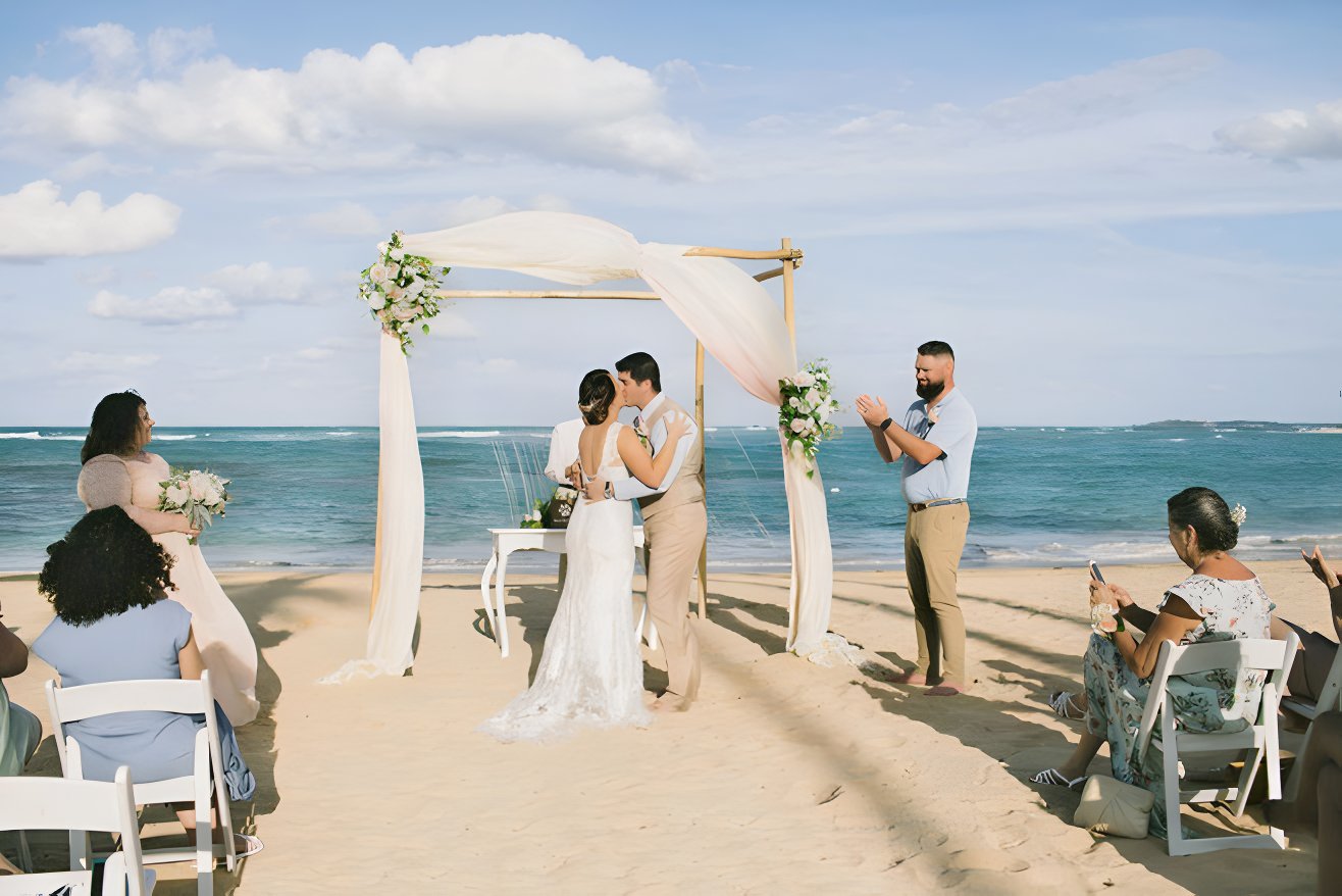 Destination wedding couple on the beach during their wedding vacation