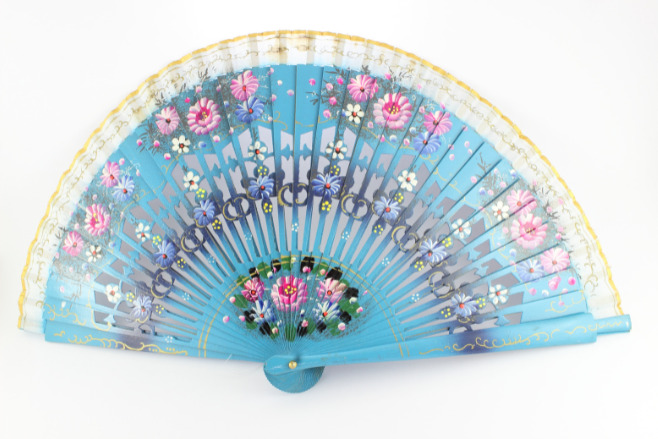 A hand fan is a great Destination Wedding Favor