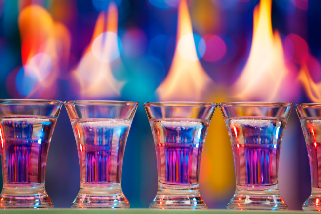 Hand painted shot glasses with fire coming out of them