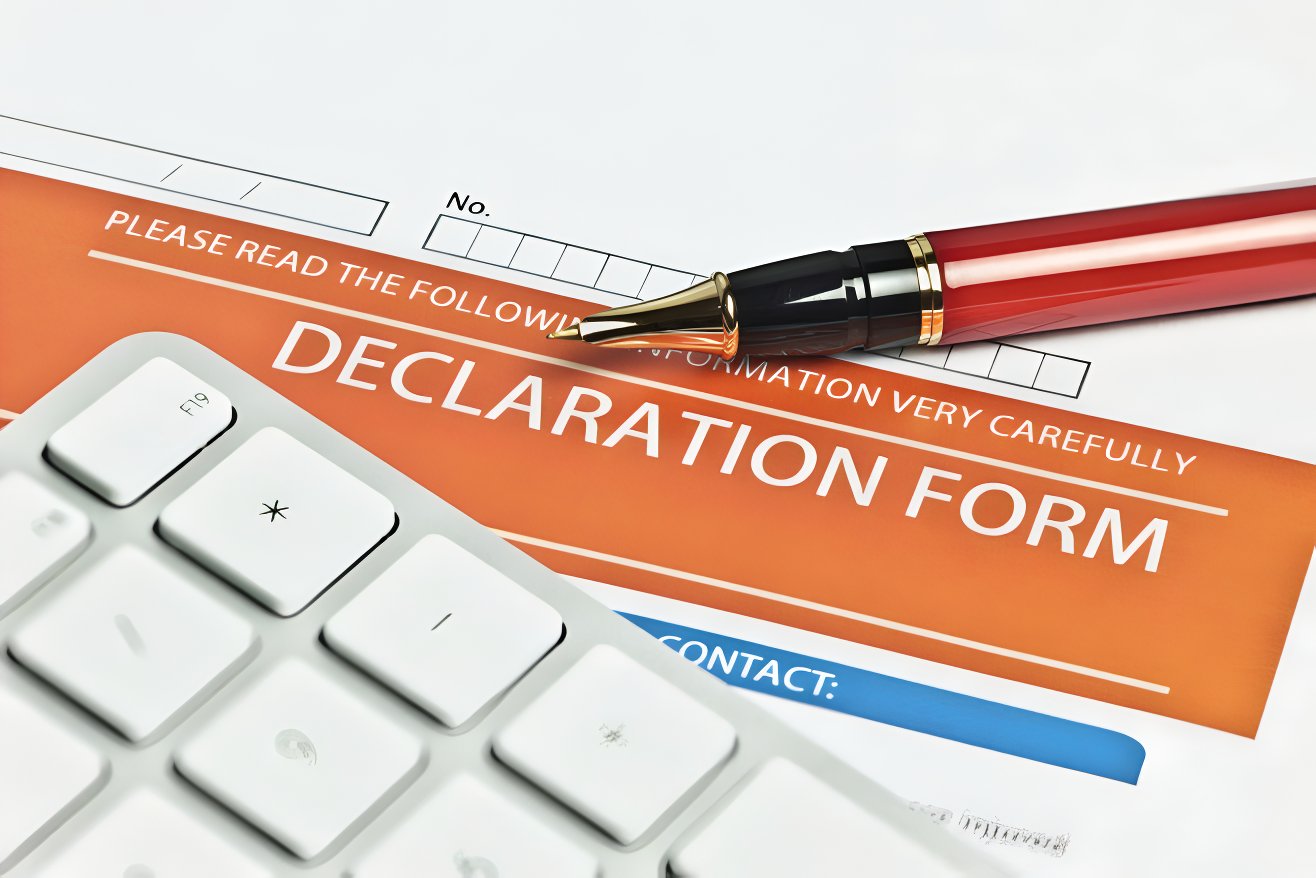 A declaration form with a pen