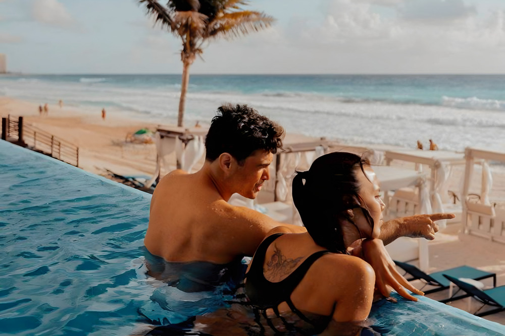 Couple in an infinity pool