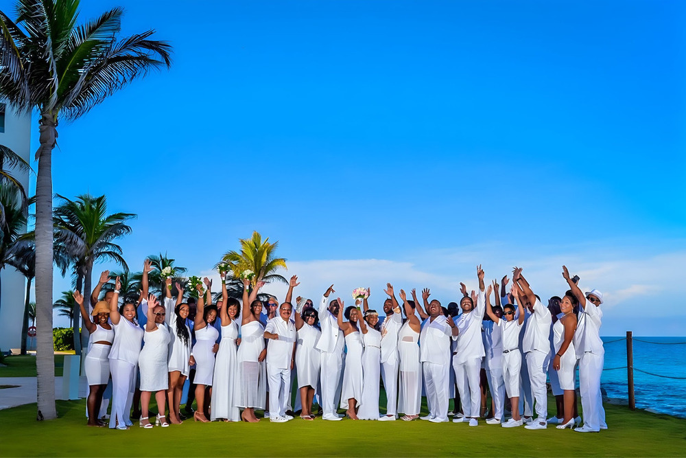 a group of people at a destination wedding