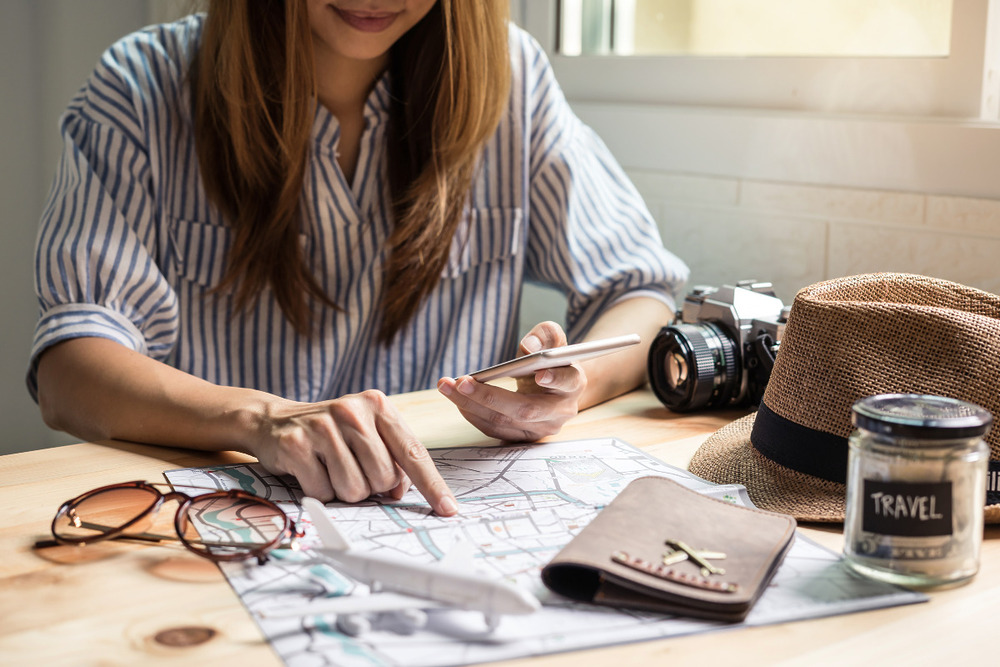 Woman researching destination travel