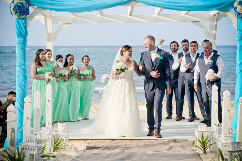 Looking for Mexico wedding packages for a beach ceremony with the bride and groom.