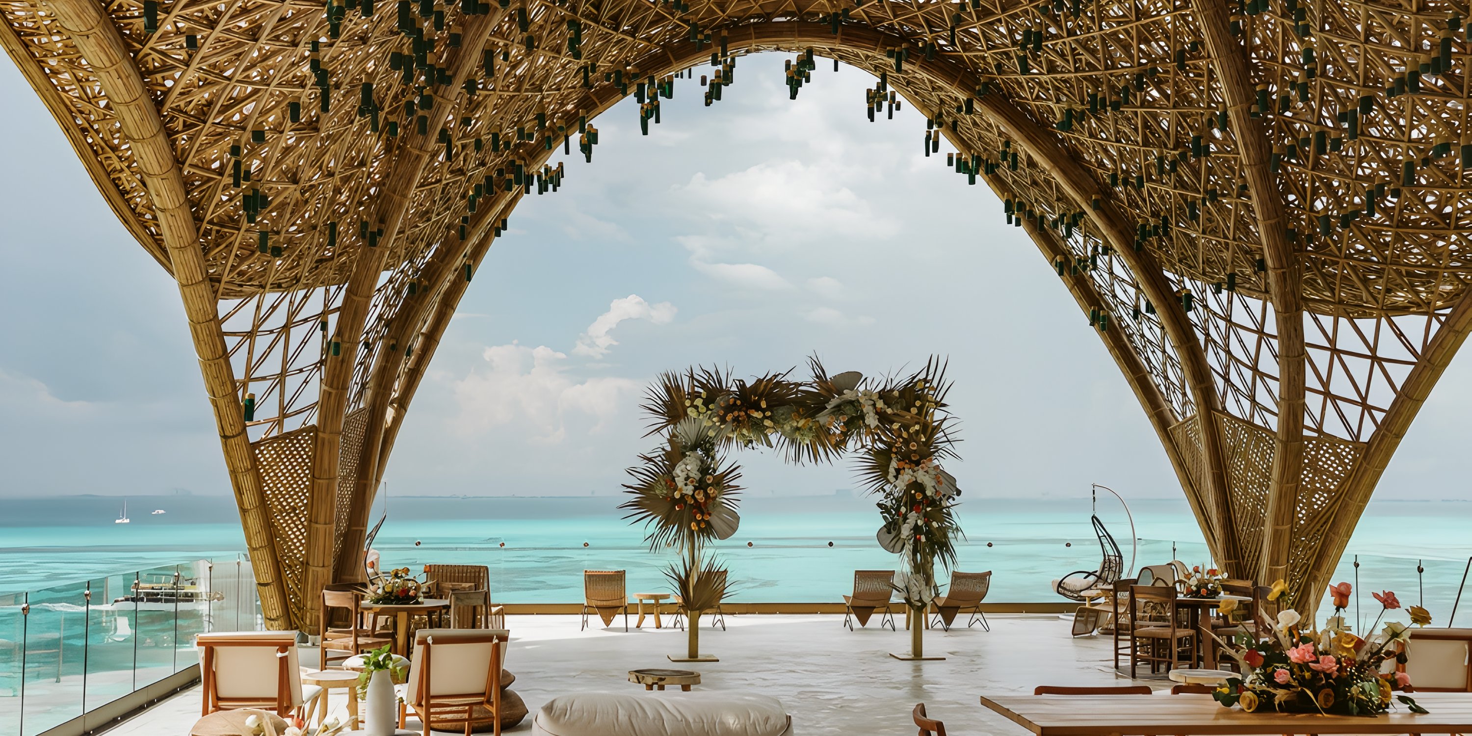 Impression Isla Mujeres by Secrets: open-air bamboo venue with ocean view, perfect for a destination wedding.