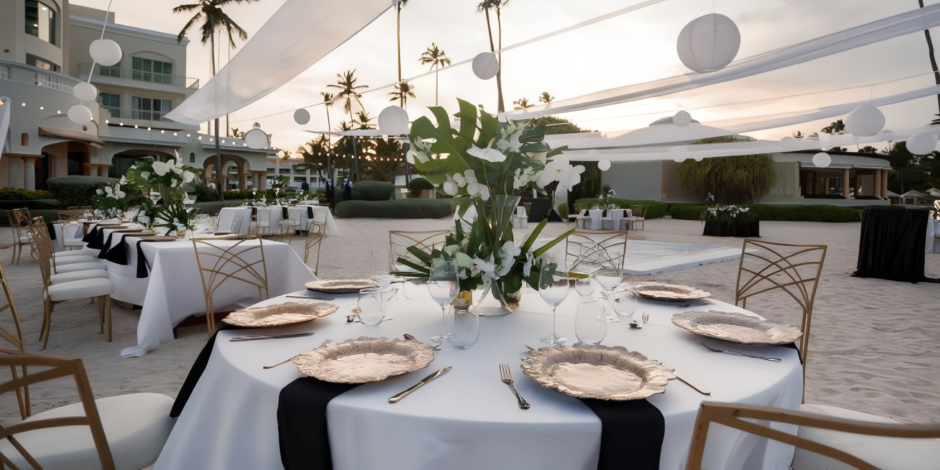 A wedding party table set at JOIA Bavaro by Iberostar, perfect for a destination wedding celebration.