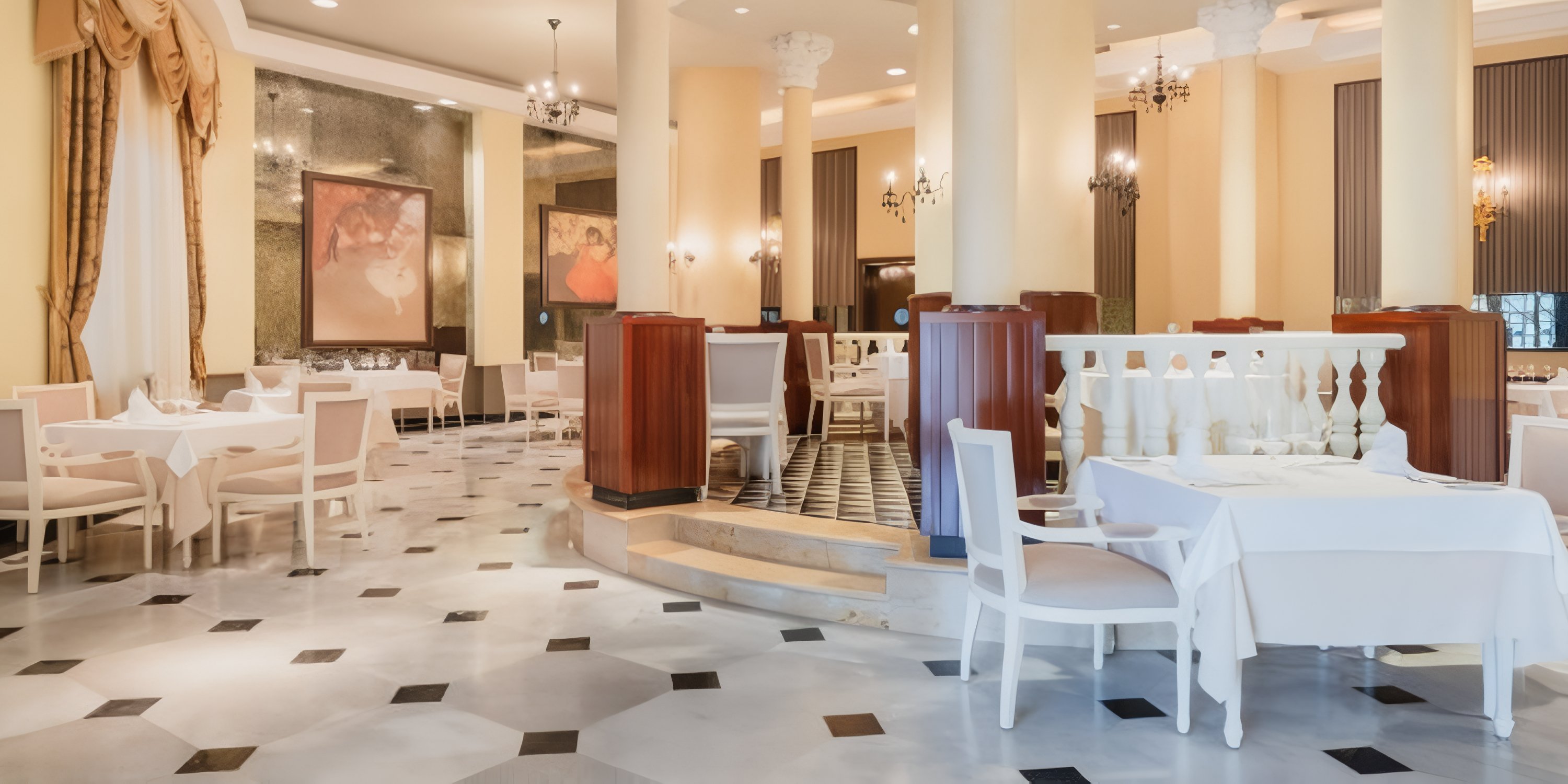 JOIA Rose Hall by Iberostar: elegant wedding dining area with white tables, chairs, and chandeliers.