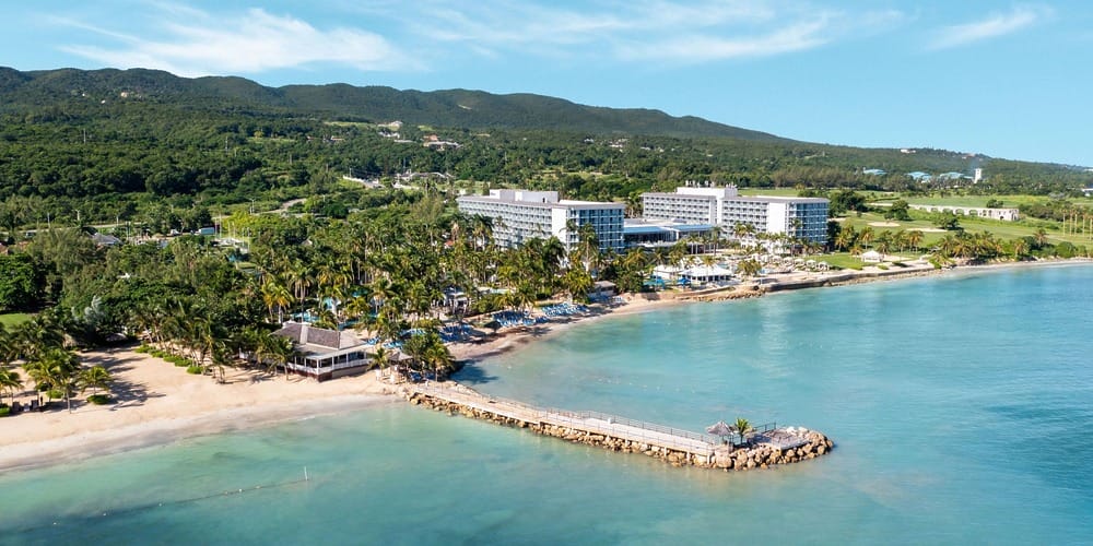 Aerial shot of a beachfront resort, perfect for destination wedding packages in Jamaica under $3,000.