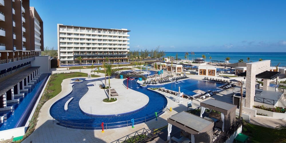 A resort with a spacious pool and ocean views, perfect for an affordable Jamaica destination wedding.