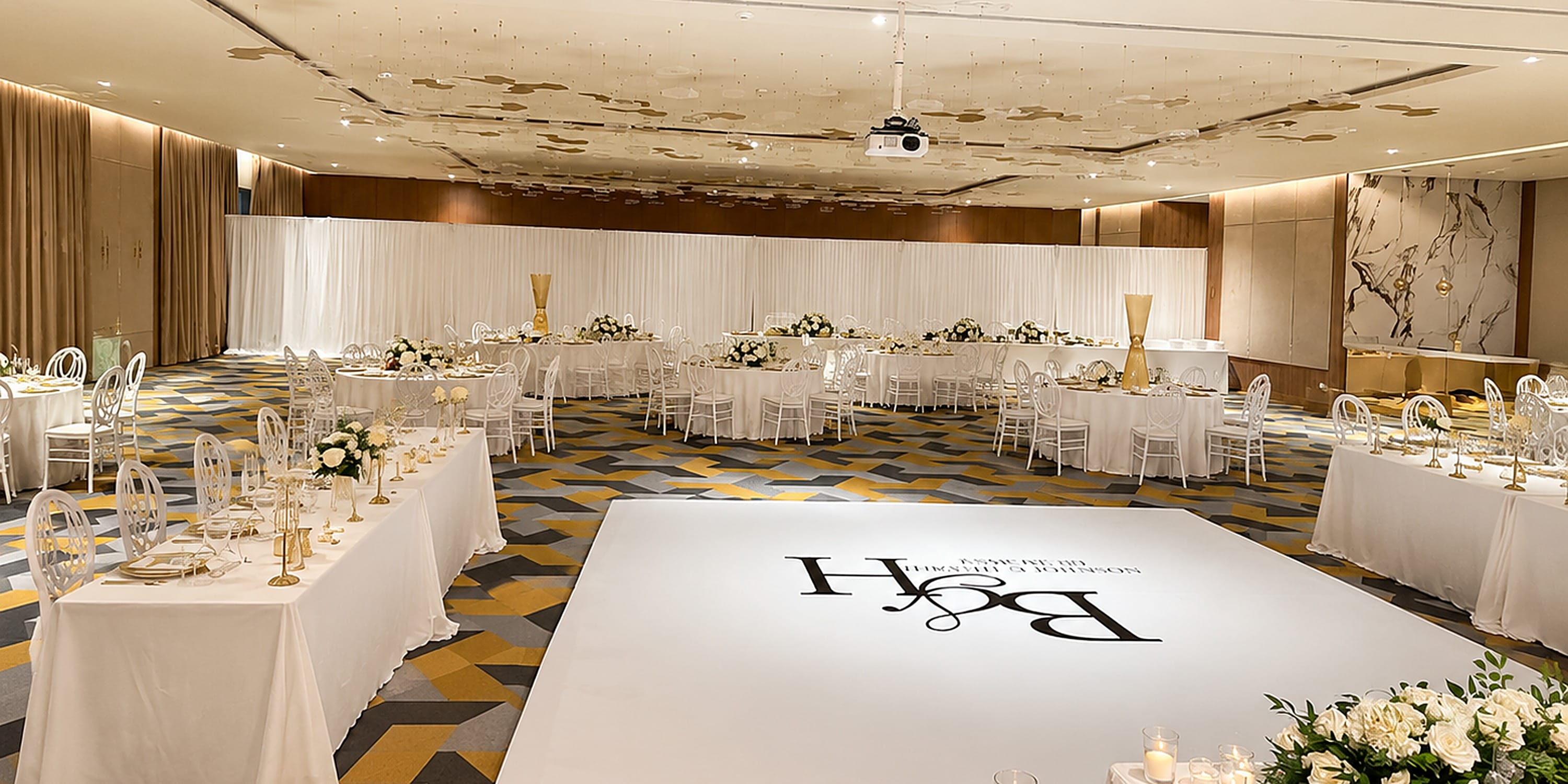 Princess Grand Jamaica ballroom set for a destination wedding with white tables and a dance floor.