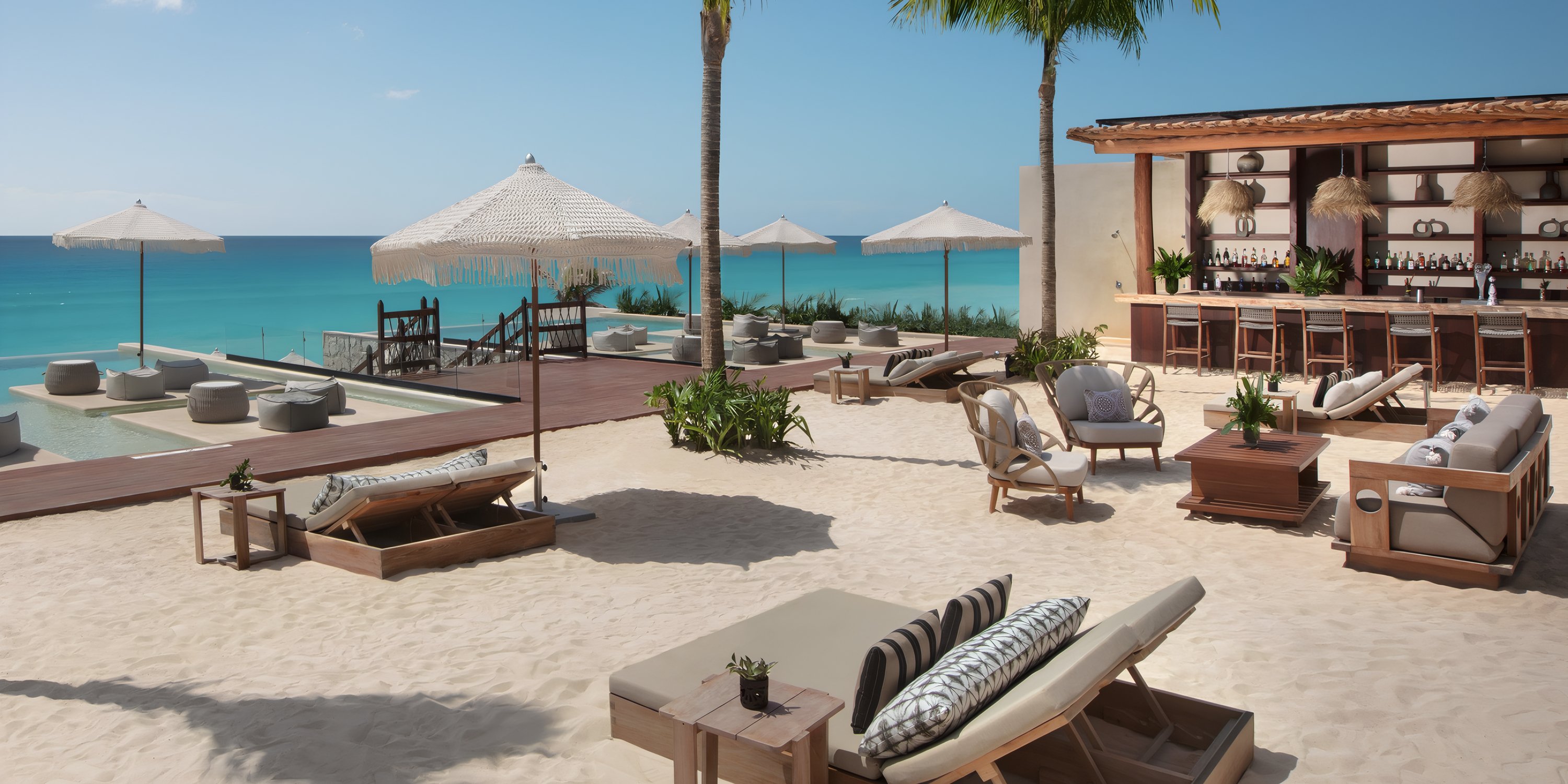 Hyatt Vivid Grand Island: beach bar and lounge ideal for a destination wedding, ocean view, umbrellas.