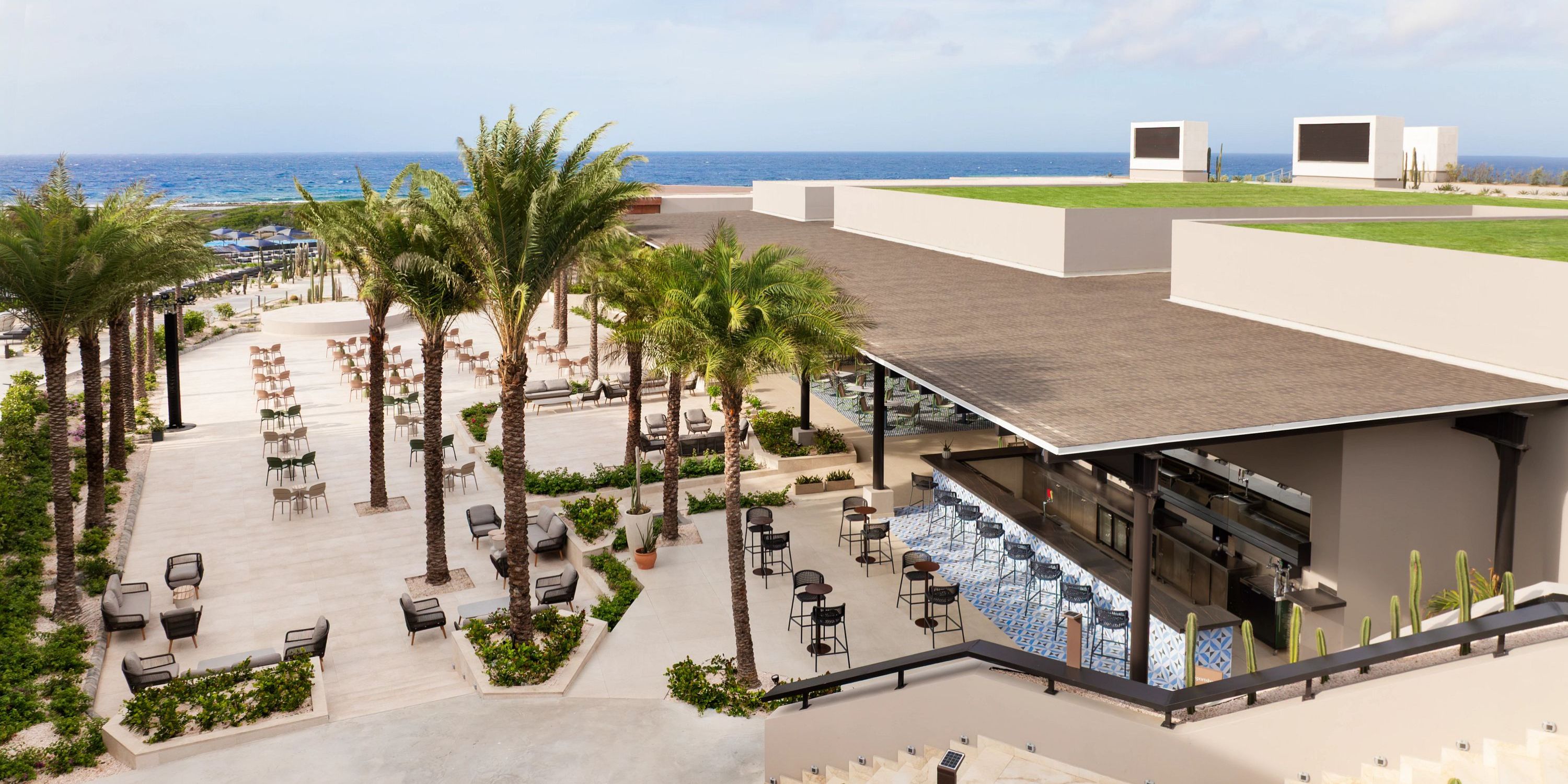 Secrets Baby Beach Aruba offers outdoor dining and seating, perfect for a destination wedding by the ocean.