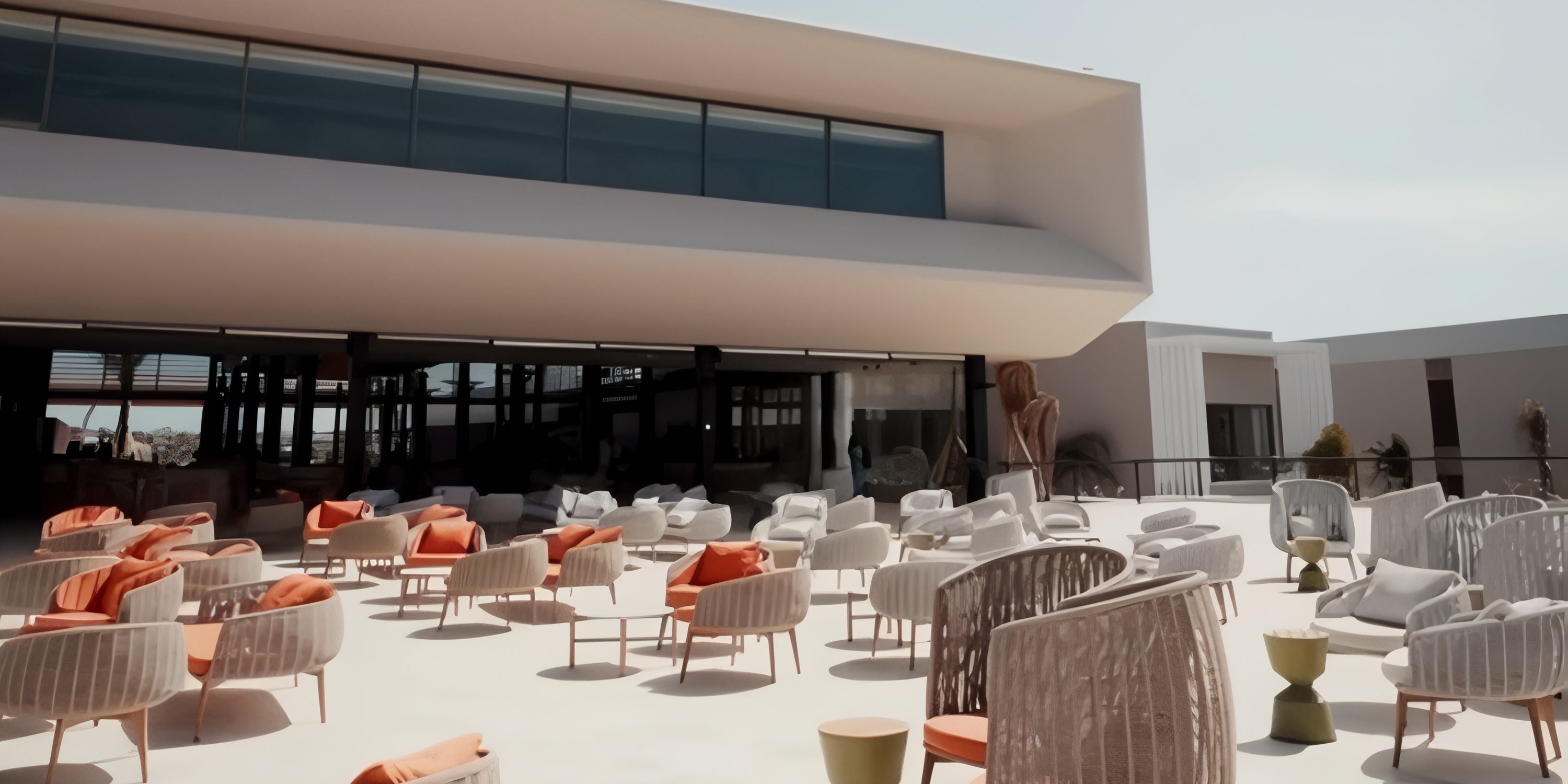 Spacious patio at Secrets Baby Beach Aruba, perfect for a destination wedding, with empty tables and chairs.