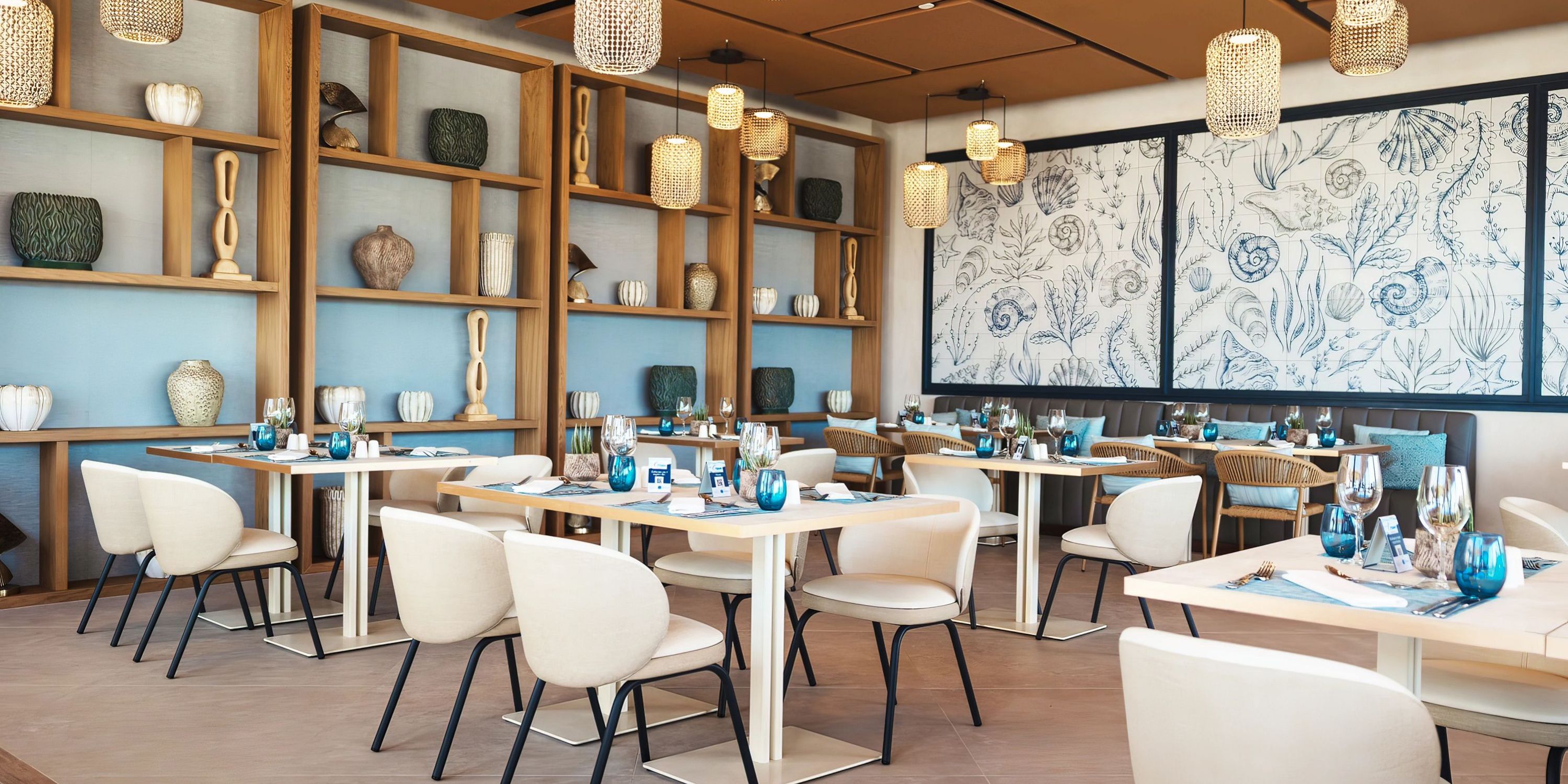 Secrets Baby Beach Aruba offers a modern restaurant, perfect for wedding dinners, with set tables and vases.