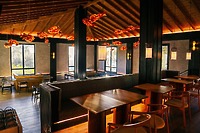 Secrets St Lucia offers a modern interior, perfect for a destination wedding, with wood tables and unique lighting.