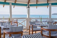 Open-air seaside dining at Secrets St Lucia, perfect for a destination wedding, with ocean views.