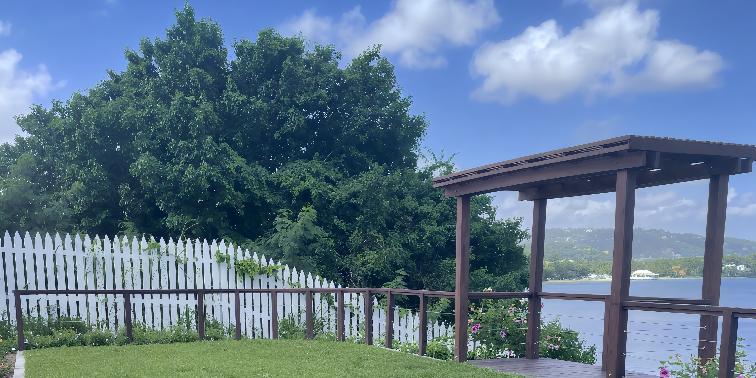 Secrets St Lucia offers a romantic wedding setting with a wooden pergola, lake, and lush greenery.