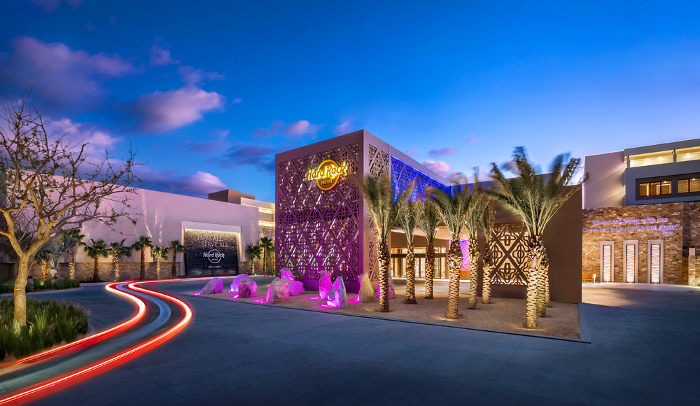 Hard Rock Hotel exterior at dusk, an ideal setting for a stylish destination wedding for 50 guests.