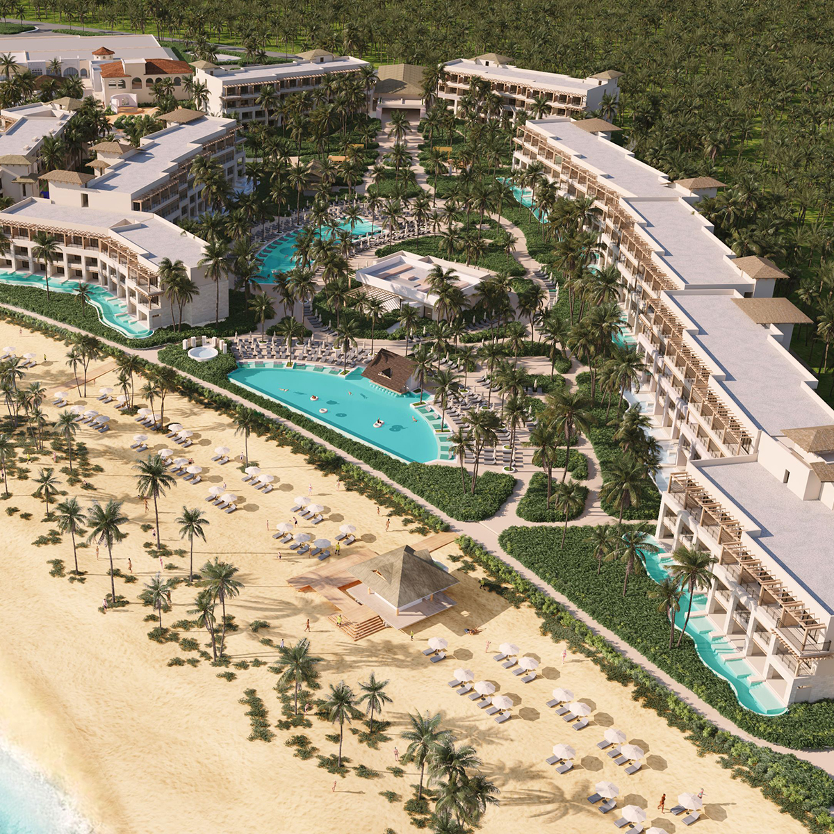 A breathtaking aerial view of Secrets Playa Esmeralda, a resort perfect for destination weddings, showcases its stunning pools and lush palm trees.