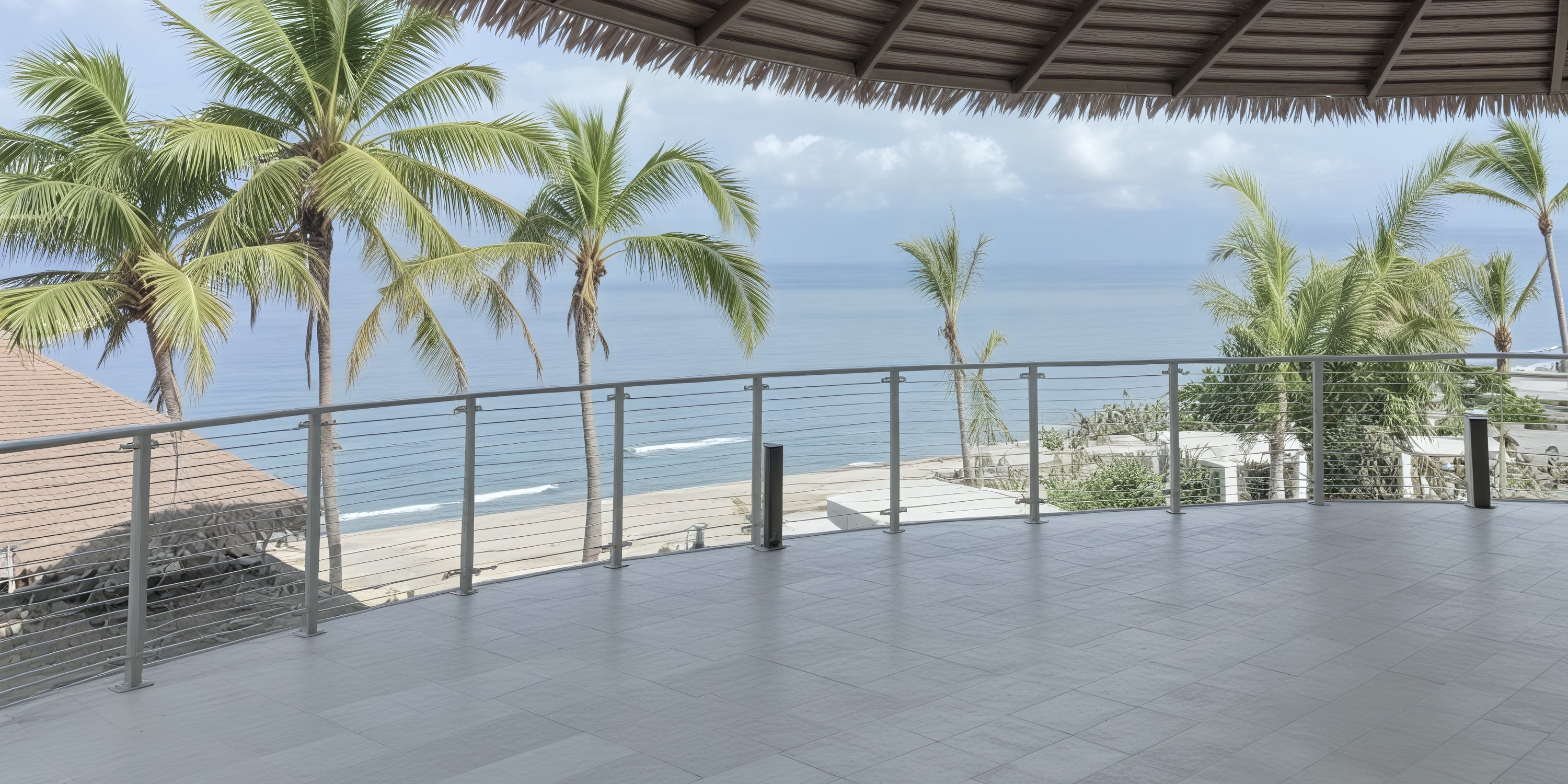 Covered balcony at UNICO 20°105° Riviera Nayarit, ideal for a destination wedding, overlooks beach and ocean.