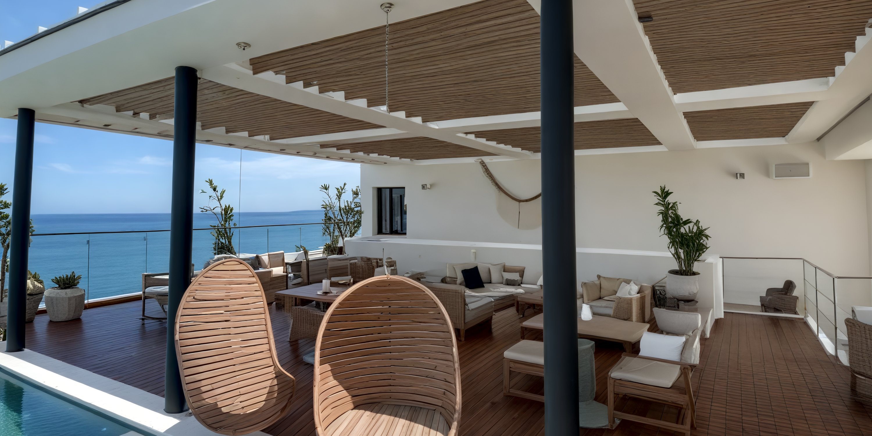 Ocean-view terrace at UNICO 20°105° Riviera Nayarit, ideal for a destination wedding with wood lounges.