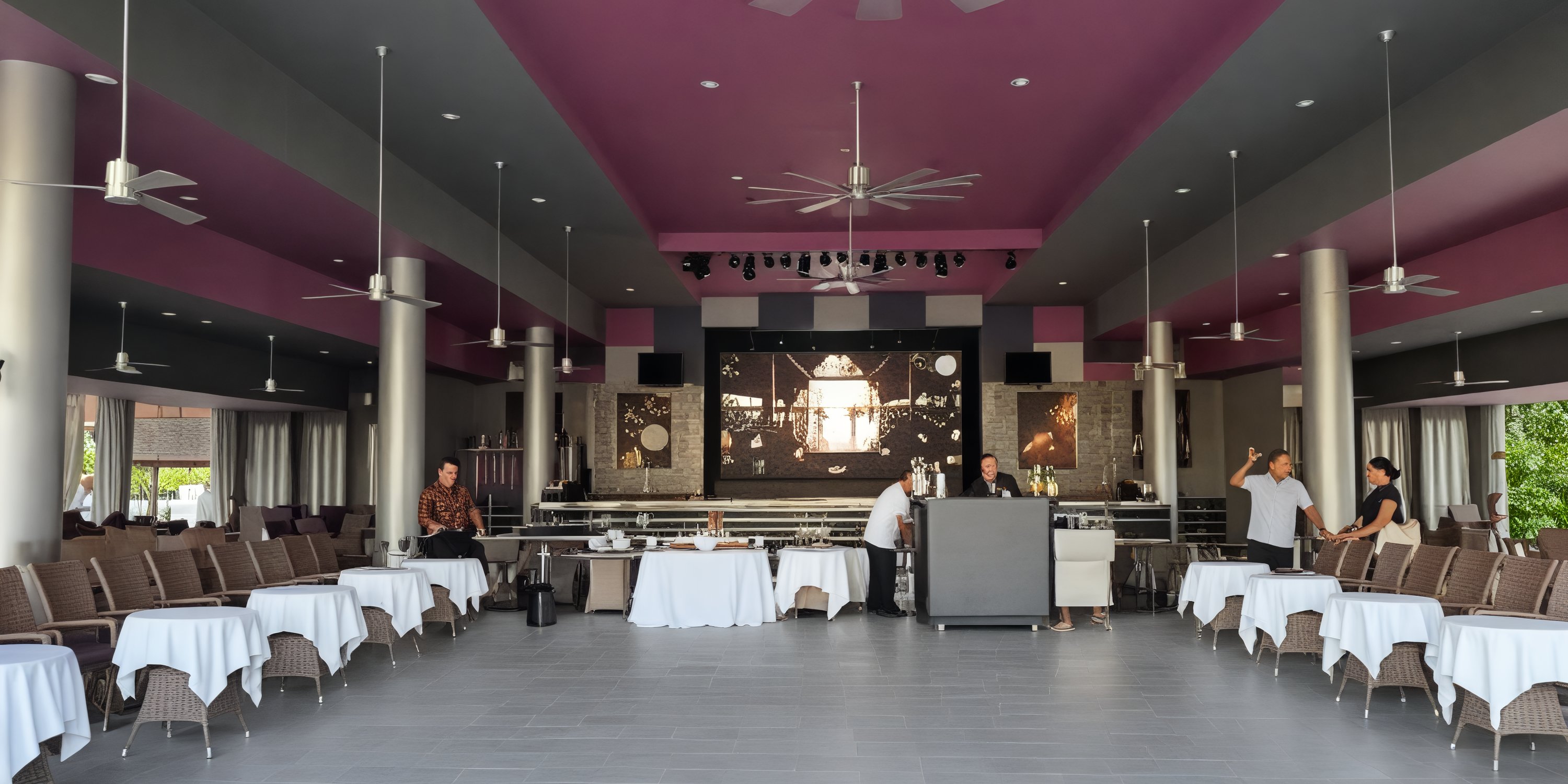 A spacious dining area is filled with tables and chairs, where people are busily preparing the space for a memorable destination wedding.