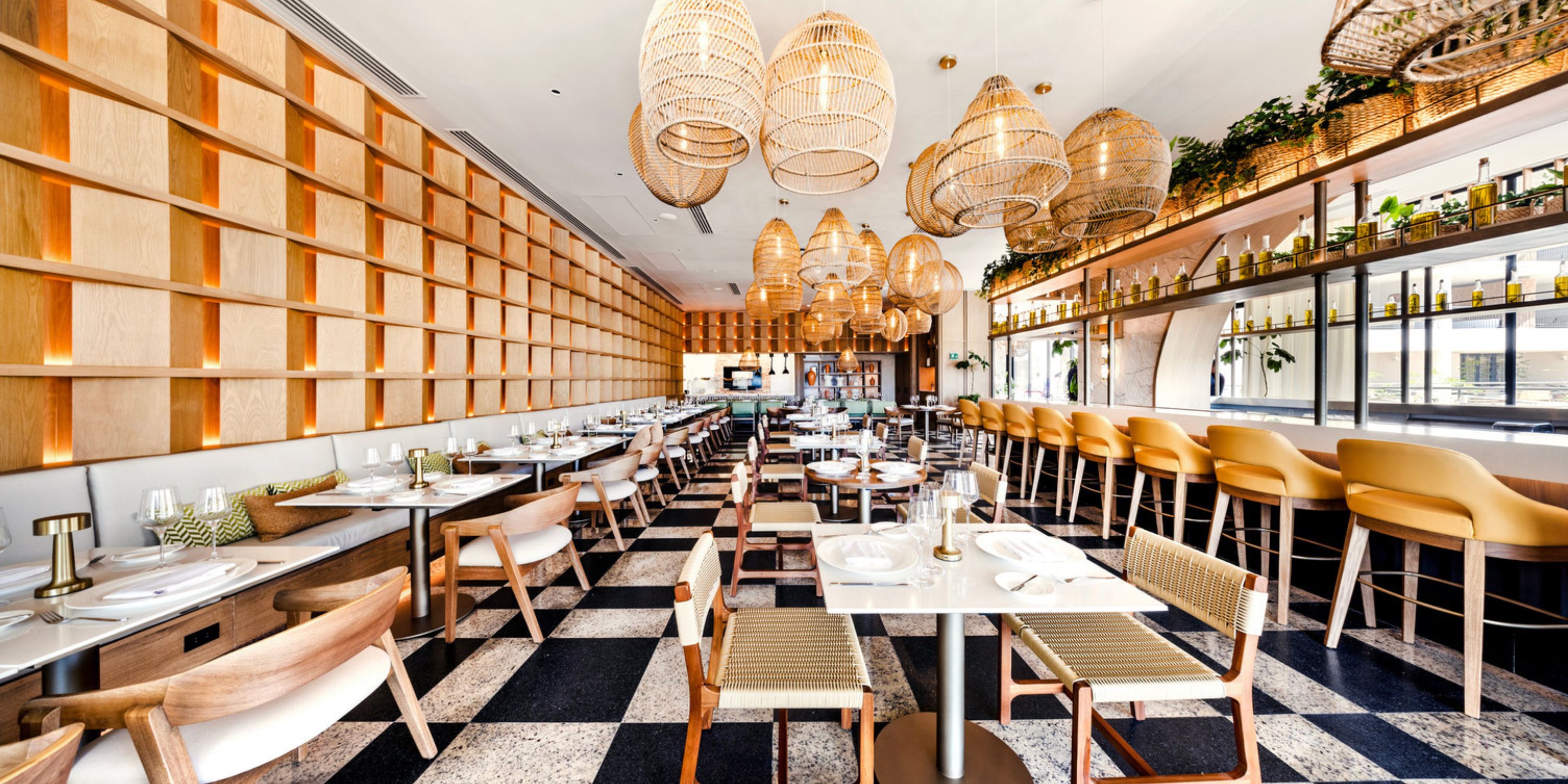 Elegant destination wedding venue at UNICO 20&deg;105&deg; Riviera Nayarit with wood accents and checkered floors.