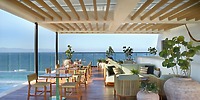 Stylish terrace at UNICO 20&deg;105&deg; Riviera Nayarit set for a destination wedding, with ocean views.