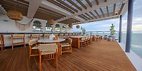 Rooftop dining at UNICO 20°105° Riviera Nayarit, perfect for a destination wedding, with ocean views.
