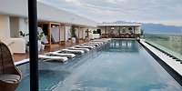 Rooftop pool at UNICO 20°105° Riviera Nayarit, perfect for a destination wedding with views and cabanas.