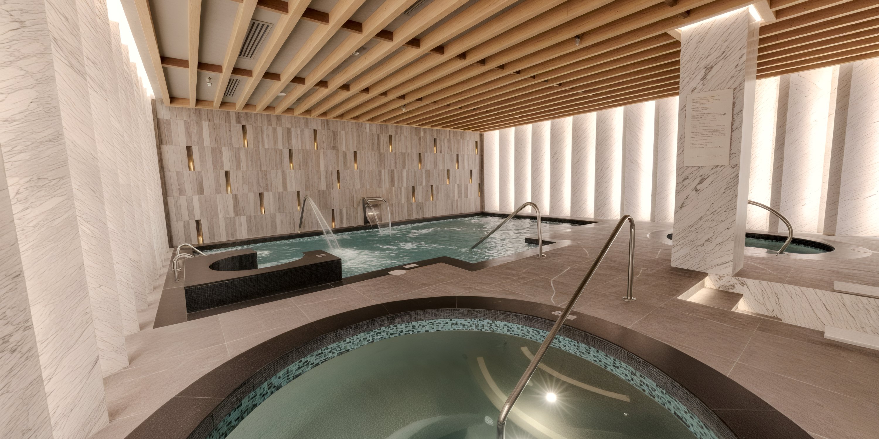UNICO 20°105° Riviera Nayarit: luxe indoor spa, ideal for destination weddings, with hot tubs and marble walls.