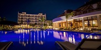 UNICO 20°105° Riviera Nayarit’s hotel and pool glow at night, perfect for a destination wedding.