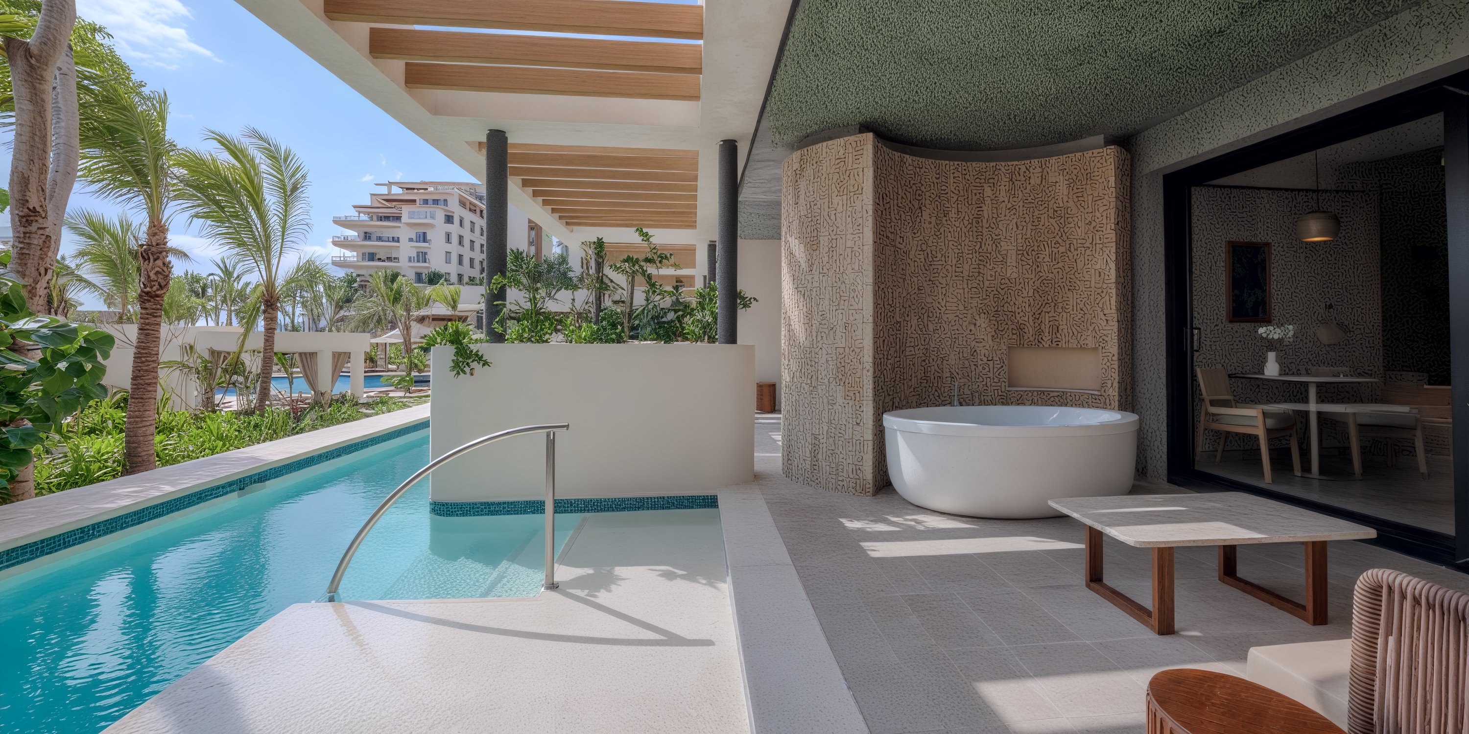Private patio with plunge pool, round tub, and seating perfect for a destination wedding at UNICO 20°105°.