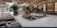 UNICO 20°87° offers a contemporary lobby featuring comfortable seating, a stylish bar, elegant trees, and expansive windows that present stunning ocean views—a perfect setting for a destination wedding.