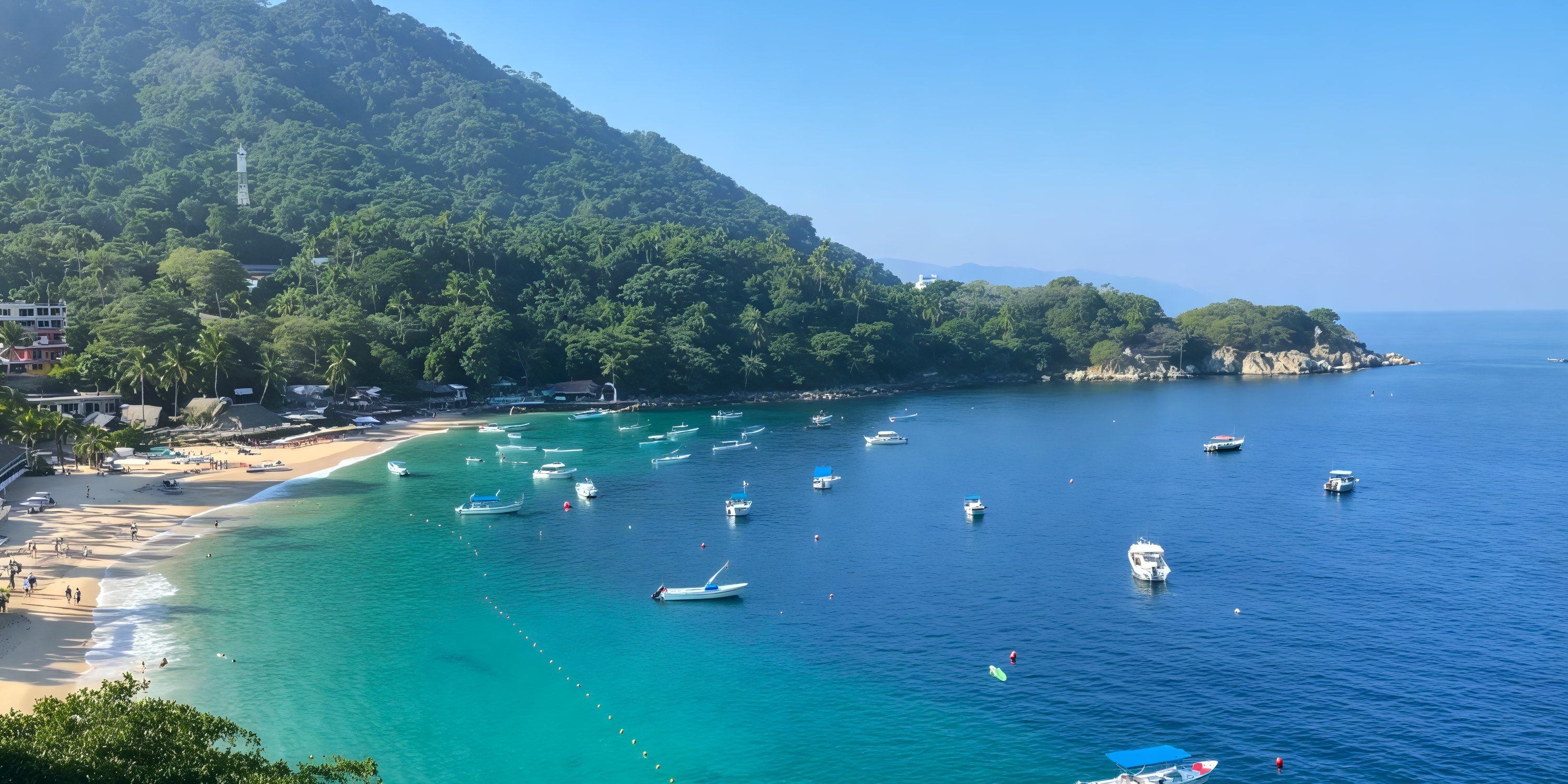 Discover the breathtaking beauty of UNICO 20°87°, an ideal destination wedding location with its stunning tropical beach, azure bay, and lush hills.