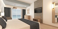 Hotel Riu Ventura room: the perfect destination wedding accommodation, featuring two comfortable beds, a TV, dresser, mirror, and stunning ocean view visible through sliding doors.