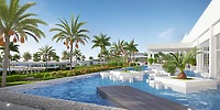 The outdoor pool at Hotel Riu Ventura, surrounded by lush gardens and elegant palm trees, features chic white in-water seating platforms—an idyllic setting for a destination wedding or an unforgettable wedding celebration.
