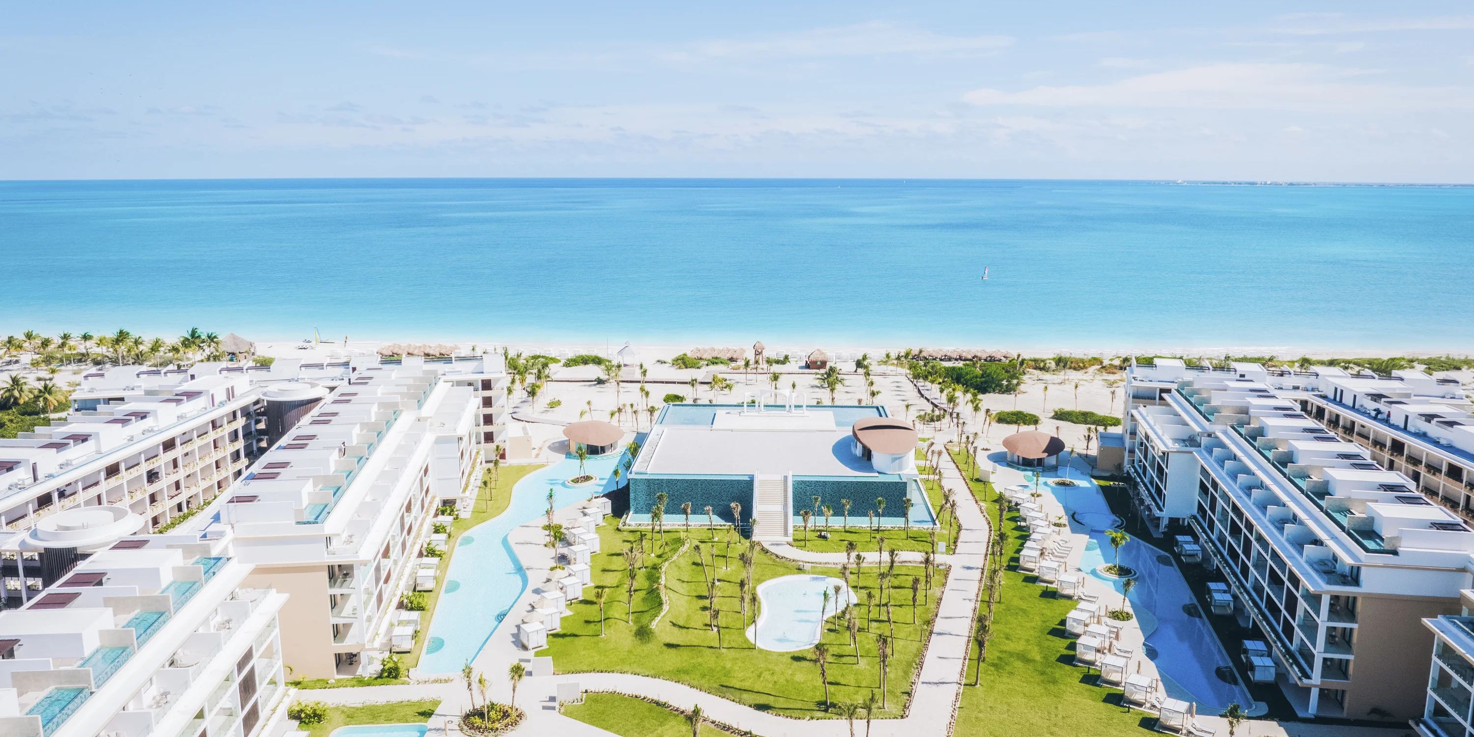 Aerial view of Majestic Mirage Costa Mujeres resort, perfect for a destination wedding with pools and gardens.