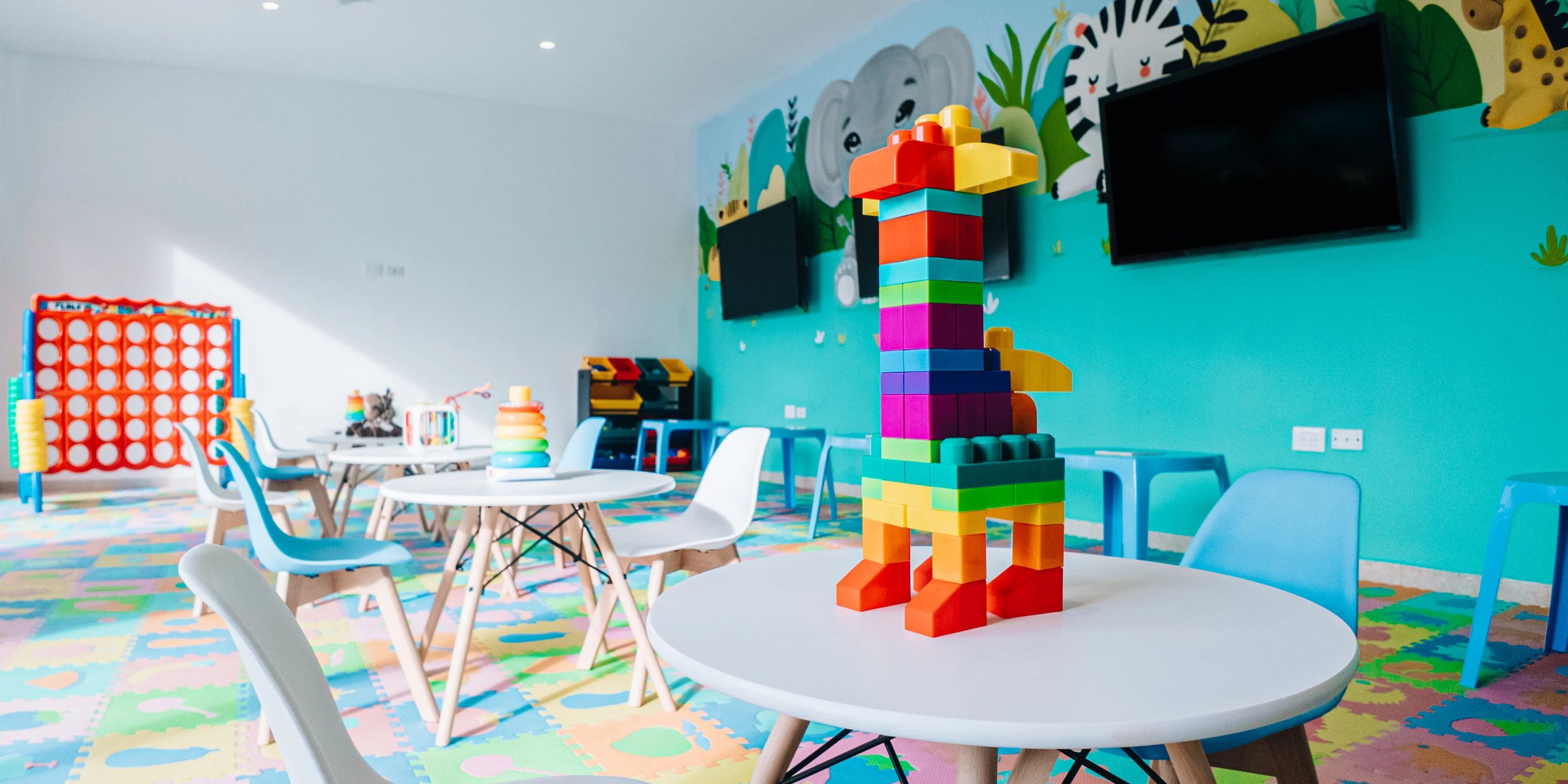 Block-built colorful toy giraffe inspired by Majestic Mirage Costa Mujeres, a destination wedding spot.