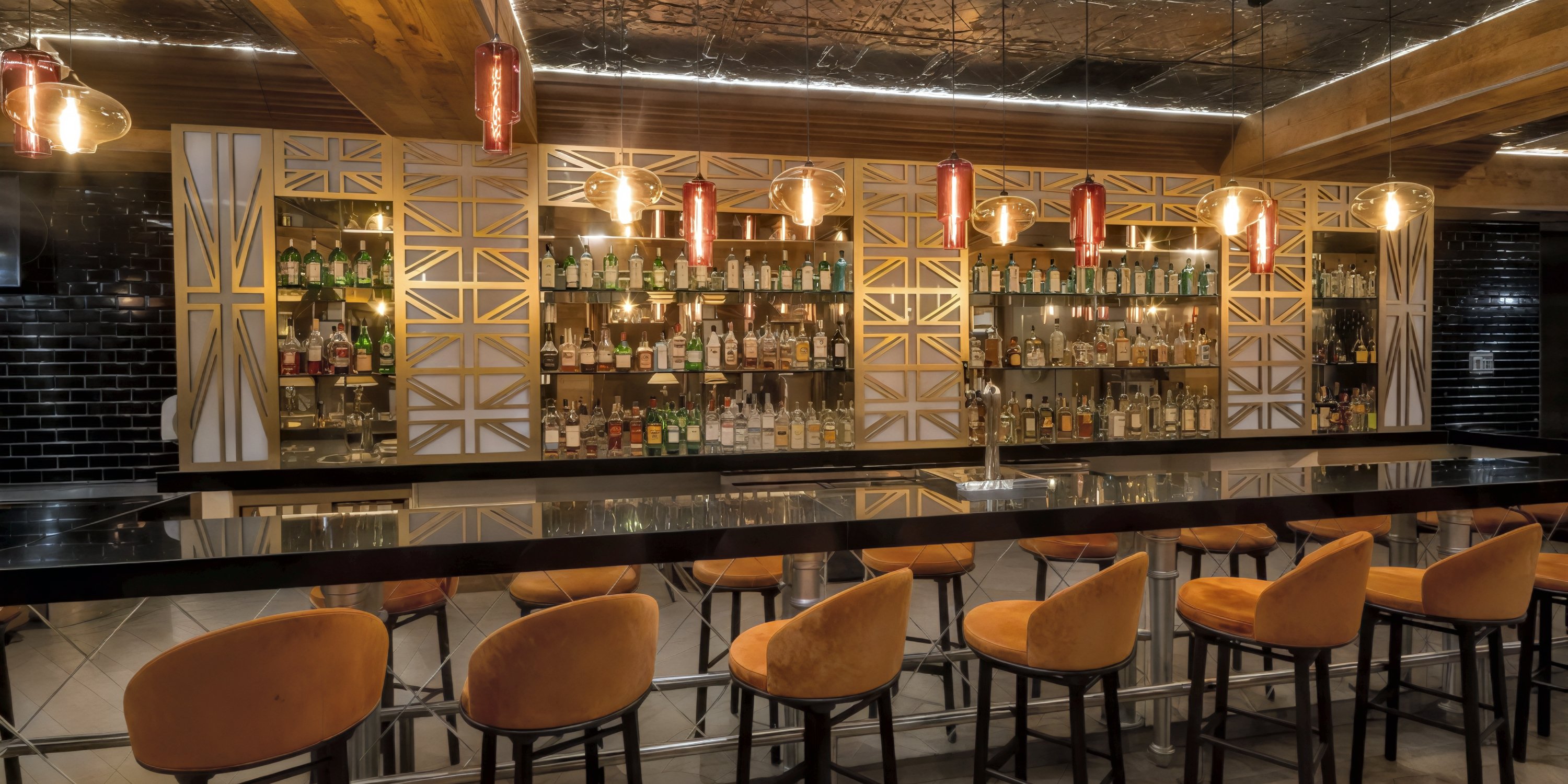 Moon Palace Nizuc offers a stunning setting for a destination wedding, featuring gold shelves, vibrant orange barstools, and elegant hanging pendant lights that create a chic and inviting atmosphere.