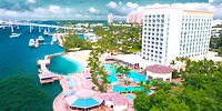 Aerial view of Warwick Paradise Island Bahamas—a stunning destination wedding spot with pools, beach, marina.