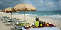Warwick Paradise Island Bahamas: fruit and wraps on a beach, ideal for a destination wedding setup.